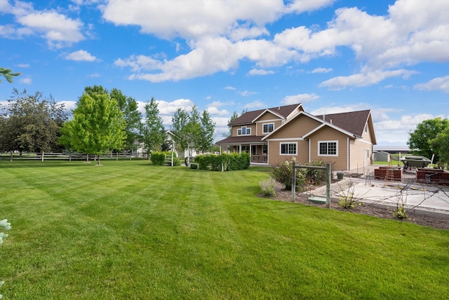 exterior space featuring a yard and a patio