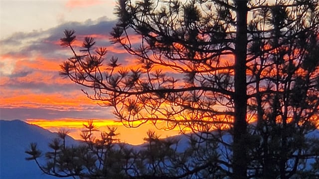 nature at dusk featuring a mountain view