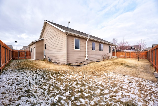 view of snow covered property