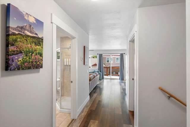 hallway with wood finished floors