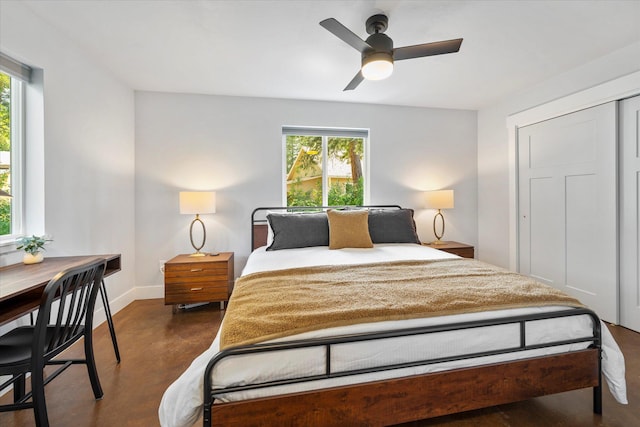 bedroom with multiple windows, baseboards, and ceiling fan