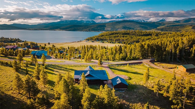 805 Georgetown Lake Rd, Anaconda, MT 59711 - drone / aerial view of a water and mountain view and a heavily wooded area