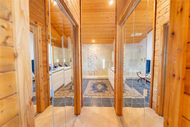 805 Georgetown Lake Rd, Anaconda, MT 59711 - full bath with vanity, lofted ceiling, wooden ceiling, a stall shower, and wooden walls