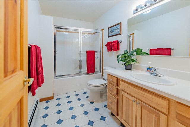805 Georgetown Lake Rd, Anaconda, MT 59711 - bathroom with a baseboard radiator, vanity, bath / shower combo with glass door, toilet, and tile patterned floors