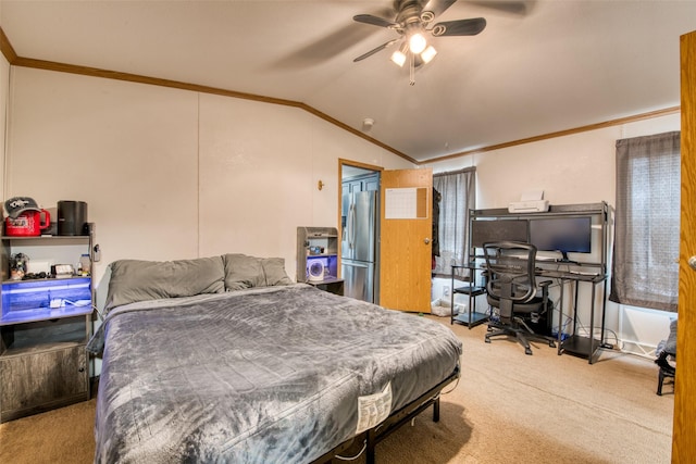 carpeted bedroom with vaulted ceiling, ceiling fan, ornamental molding, and stainless steel fridge