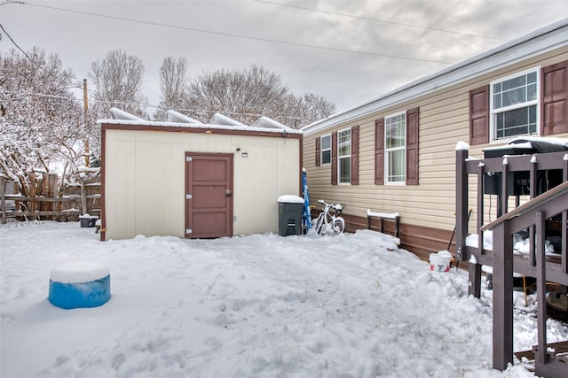 exterior space featuring a storage unit