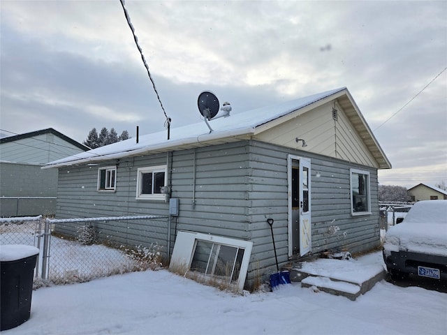 view of snow covered property