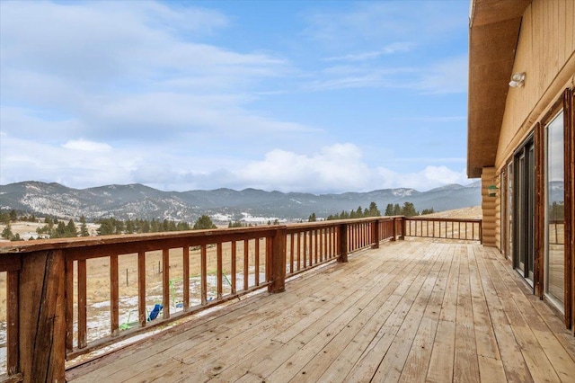 wooden terrace with a mountain view