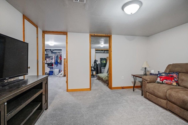 living room with light colored carpet