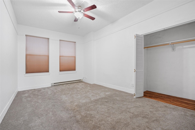 carpeted bedroom featuring a textured ceiling