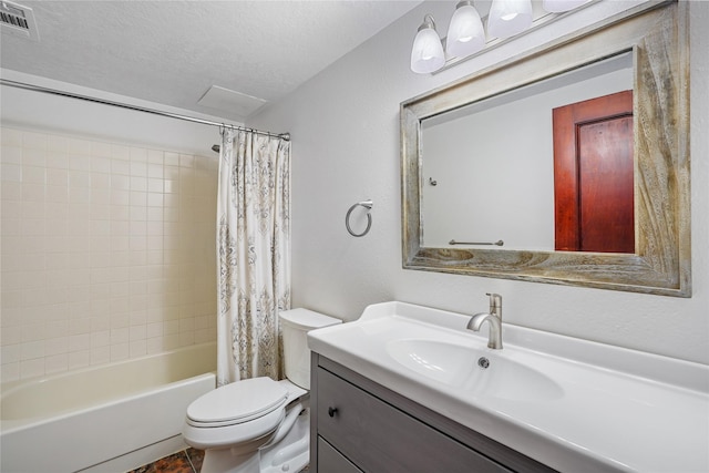 full bathroom with shower / bath combination with curtain, vanity, toilet, and a textured ceiling