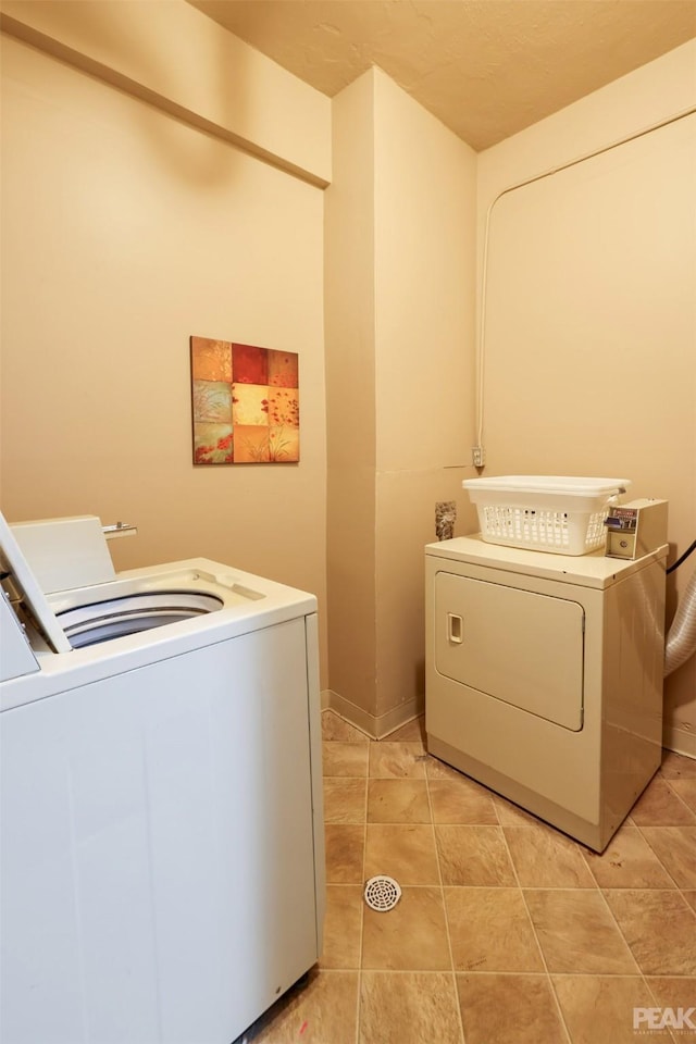 laundry area featuring washer and clothes dryer