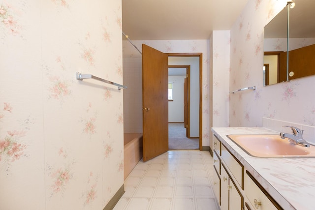 bathroom with shower / washtub combination and vanity