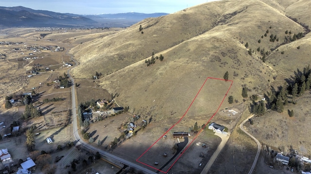 aerial view featuring a mountain view