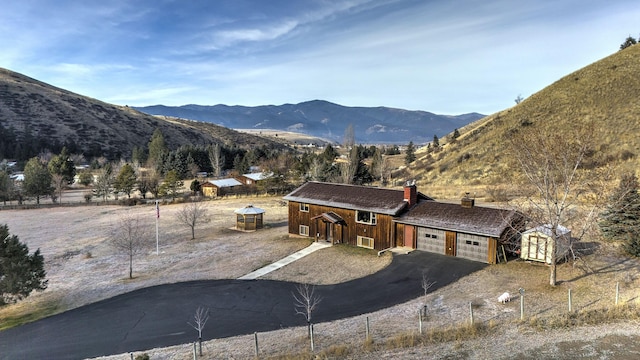 view of mountain feature featuring a rural view