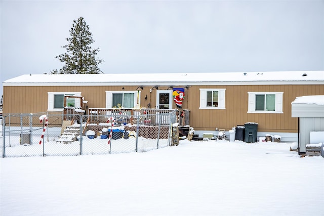 view of snow covered property