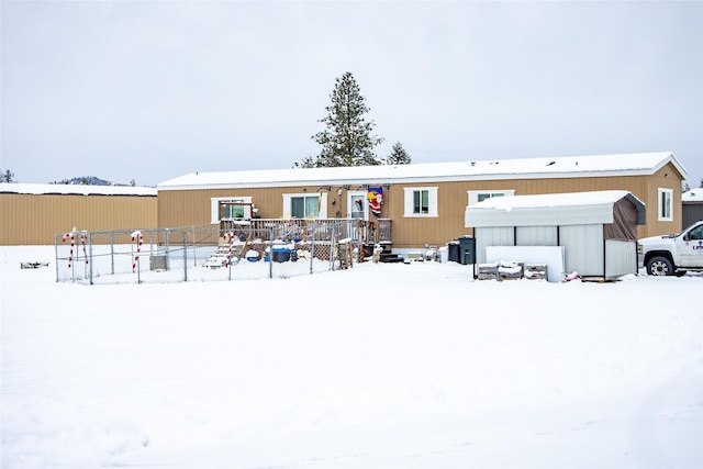 view of snow covered property