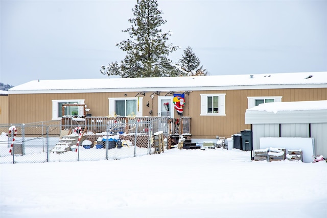 view of snow covered property