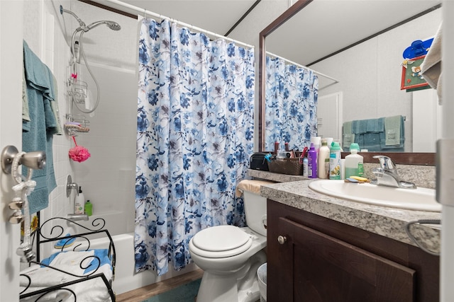 full bathroom featuring vanity, shower / bath combo, and toilet