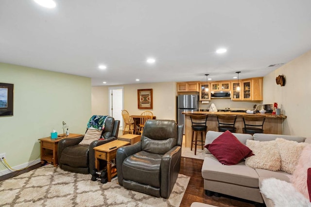 living room with hardwood / wood-style flooring