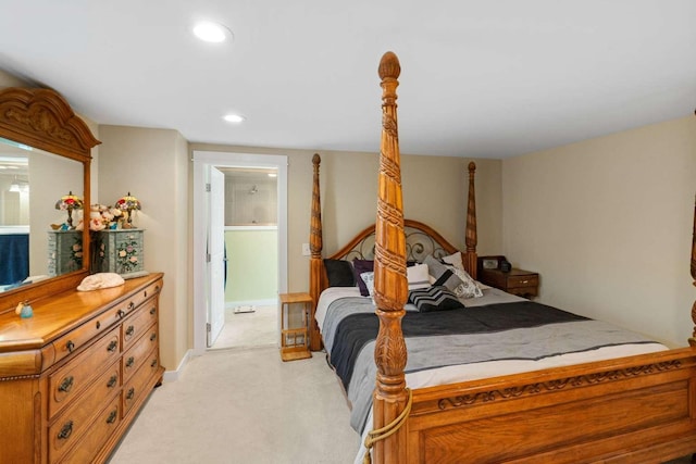 bedroom featuring light colored carpet