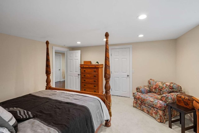 bedroom with light colored carpet