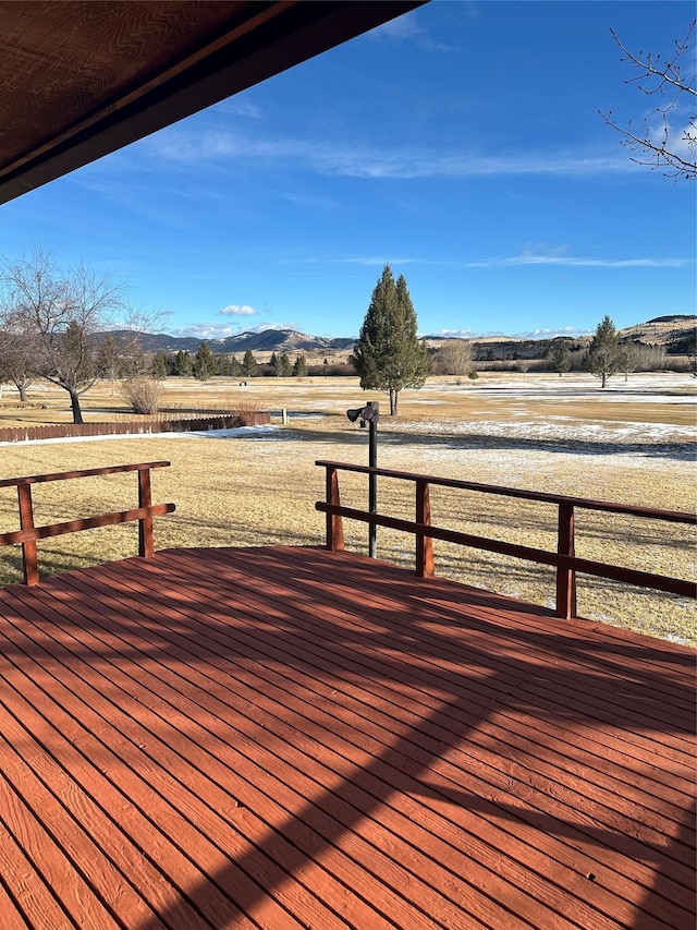 wooden terrace with a mountain view and a rural view