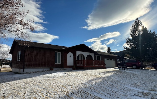 single story home featuring a garage