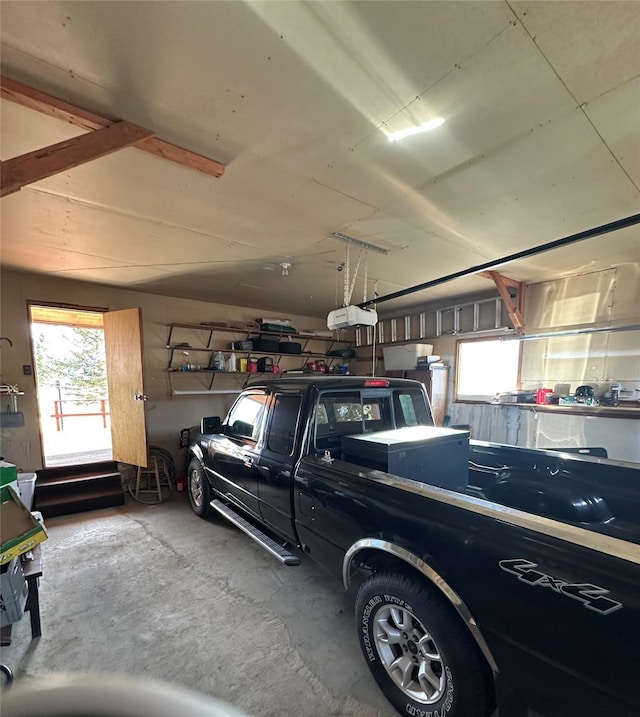 garage featuring a garage door opener