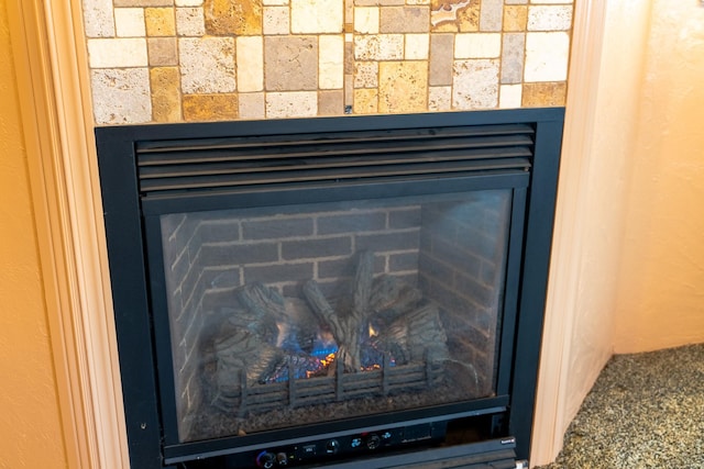 interior details featuring a fireplace