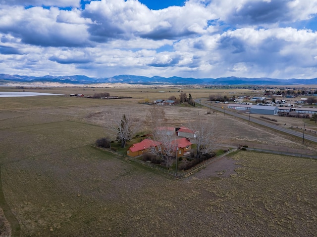 bird's eye view with a rural view and a mountain view