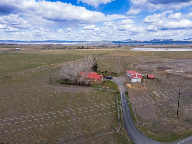 drone / aerial view with a rural view and a mountain view