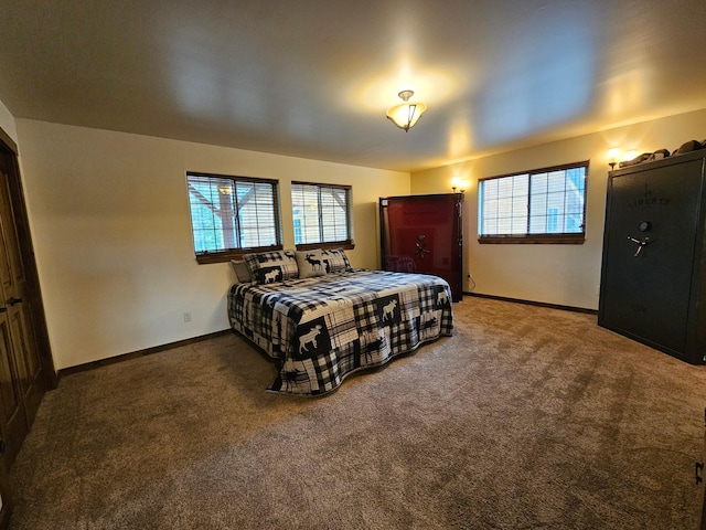 bedroom featuring carpet flooring and multiple windows