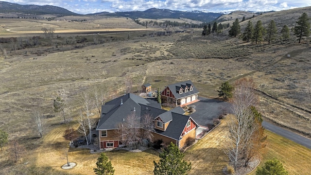 bird's eye view with a mountain view and a rural view