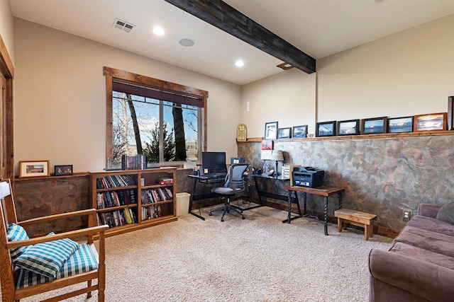 office space with beamed ceiling and carpet floors