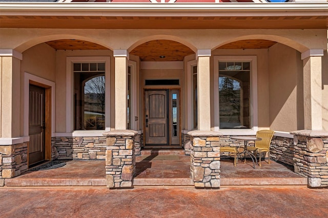 entrance to property with covered porch