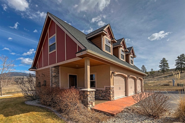 view of property exterior with a garage