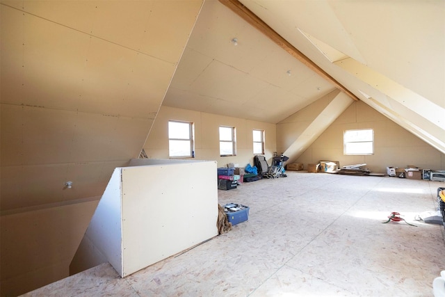 additional living space with lofted ceiling