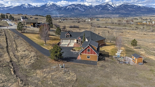 aerial view featuring a mountain view and a rural view