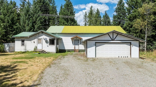 ranch-style home featuring a garage