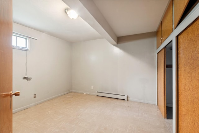 basement with baseboard heating