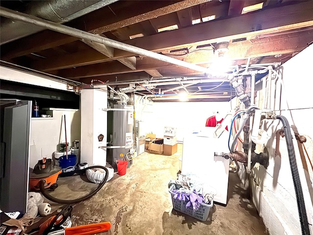 unfinished basement with washer / dryer and water heater