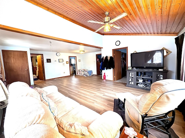 living area with lofted ceiling, wooden ceiling, a ceiling fan, and wood finished floors