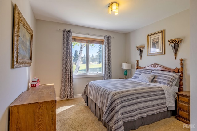 bedroom with light carpet