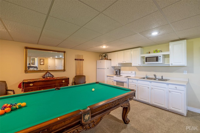 recreation room featuring light colored carpet, sink, and pool table