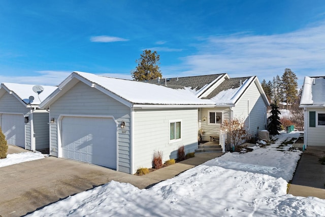 view of front of property with a garage