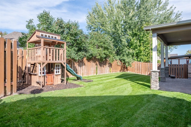 view of yard with a playground