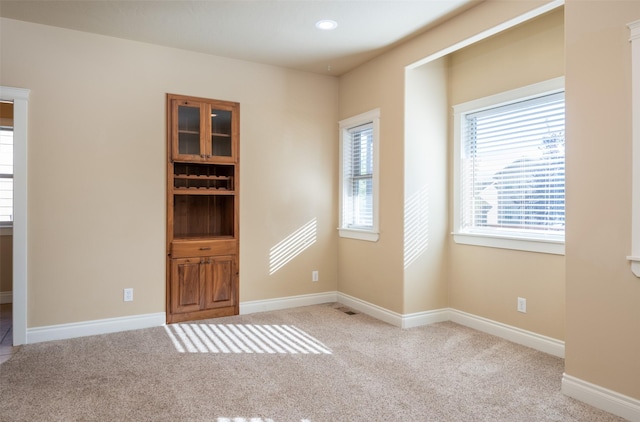 view of carpeted spare room