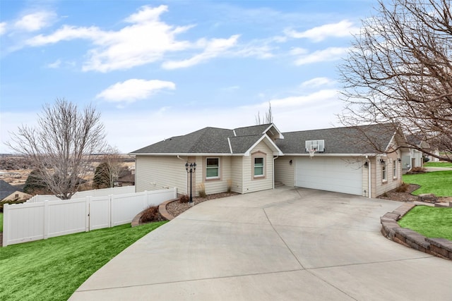 ranch-style house featuring a front lawn and a garage