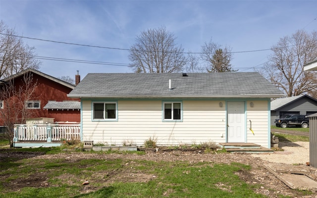 200 N Ave W, Missoula, MT 59801 - rear view of house featuring a wooden deck and roof with shingles